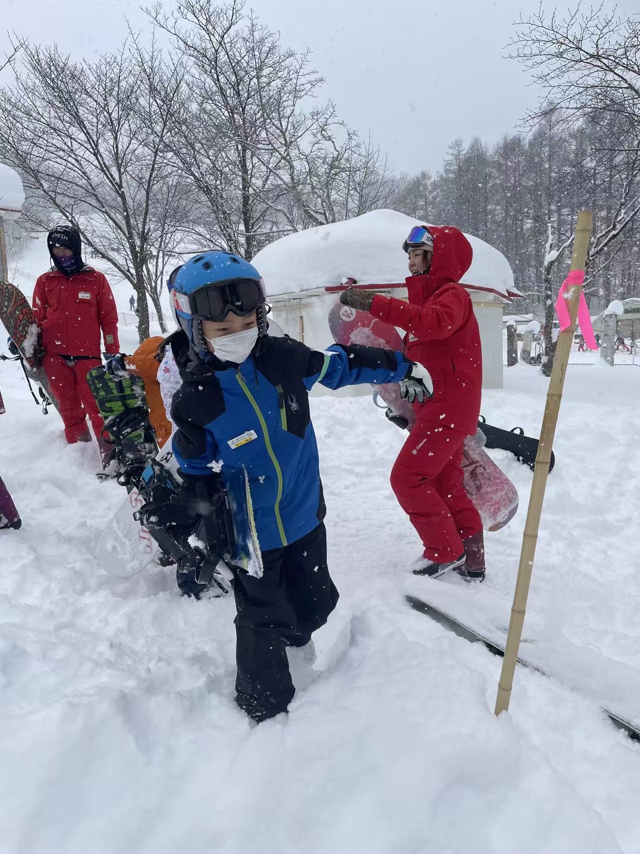 Child on a snowy ski day in Hokkaido