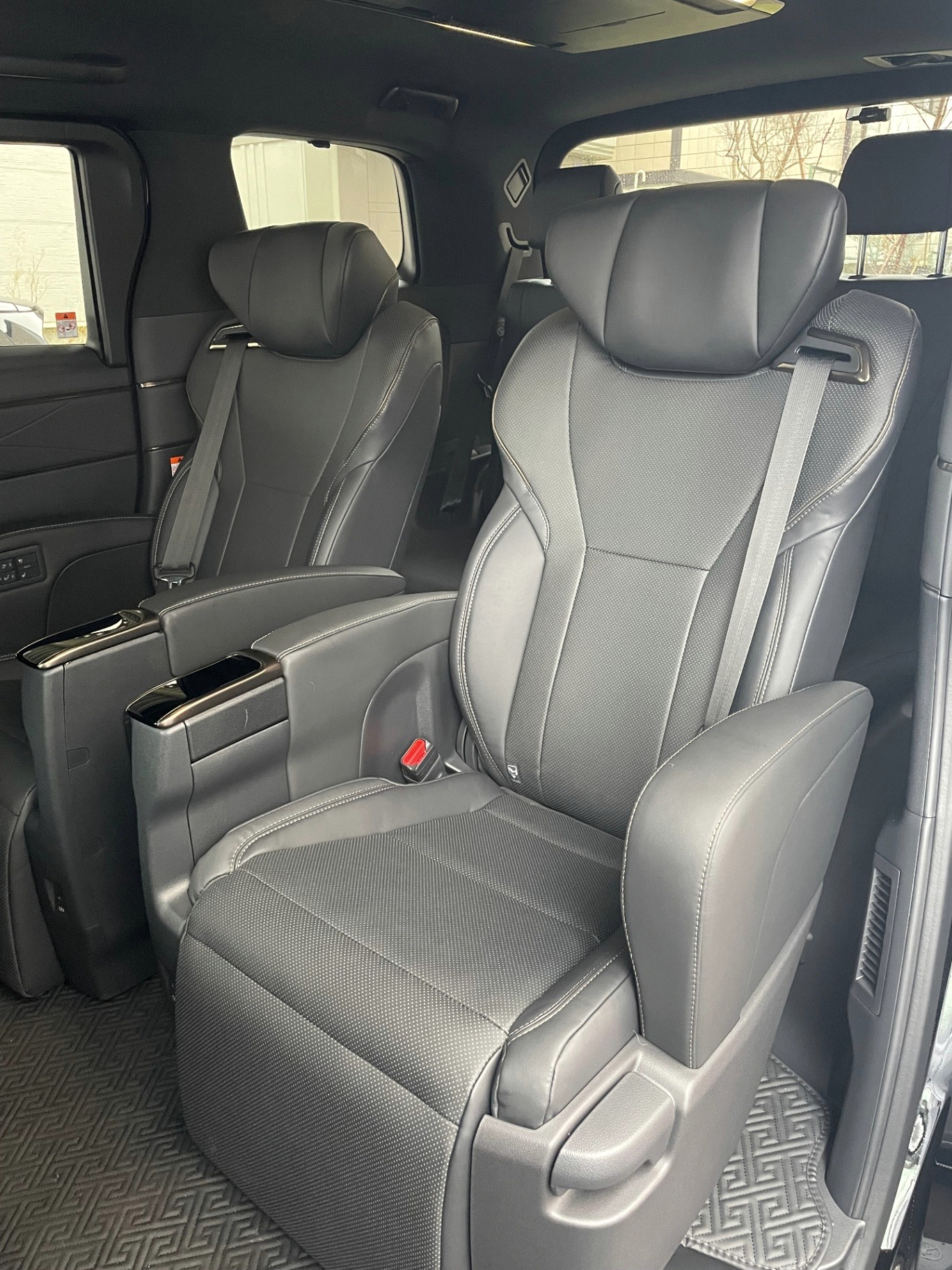 Executive captain seat inside a Toyota Alphard private charter
