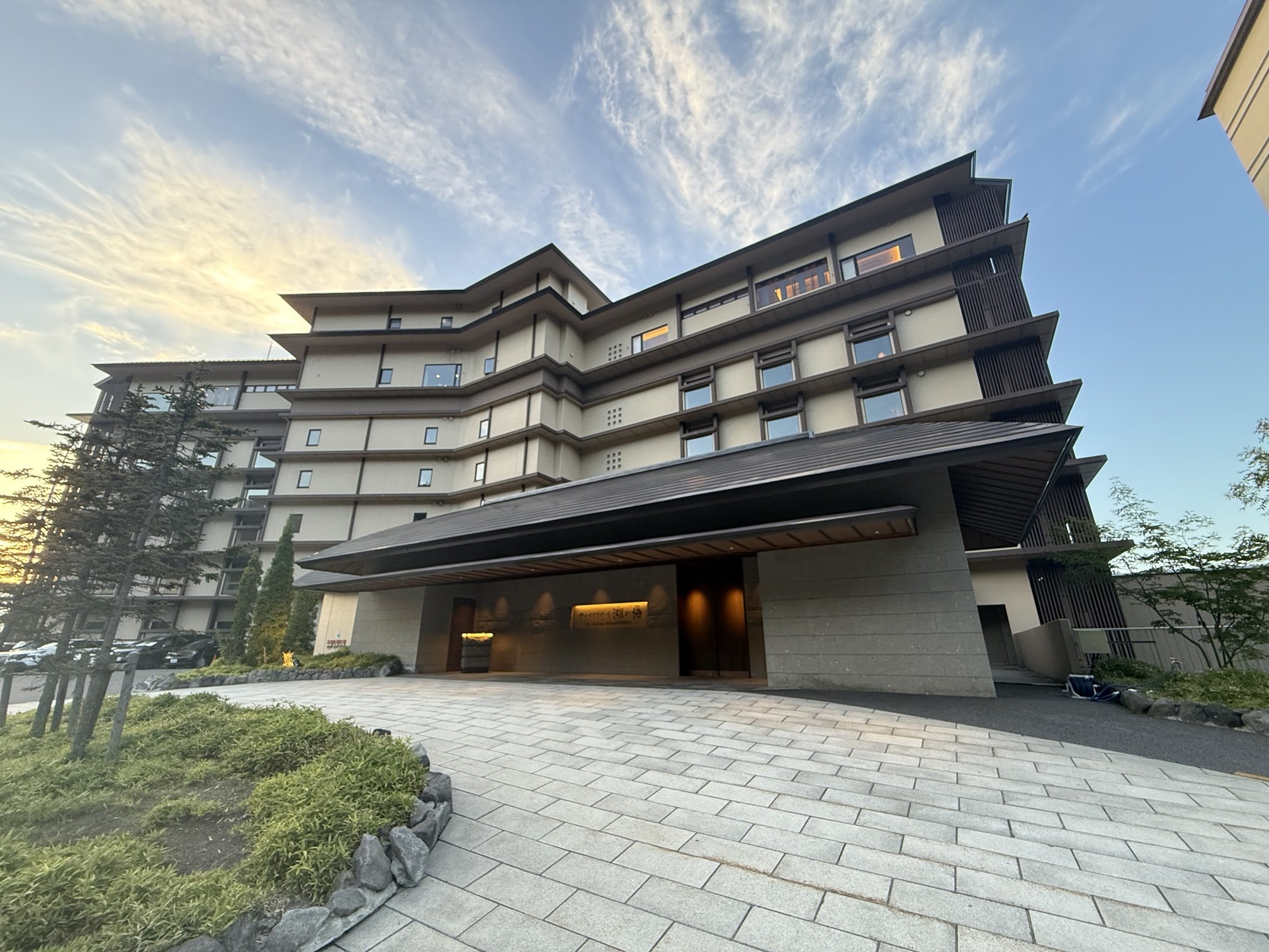 Luxury hotel suite living room with Hokkaido mountain views